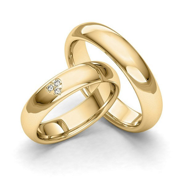 Romantiske Siersbøl vielsesringe i 9 eller 14 karat guld med hjerte af diamanter